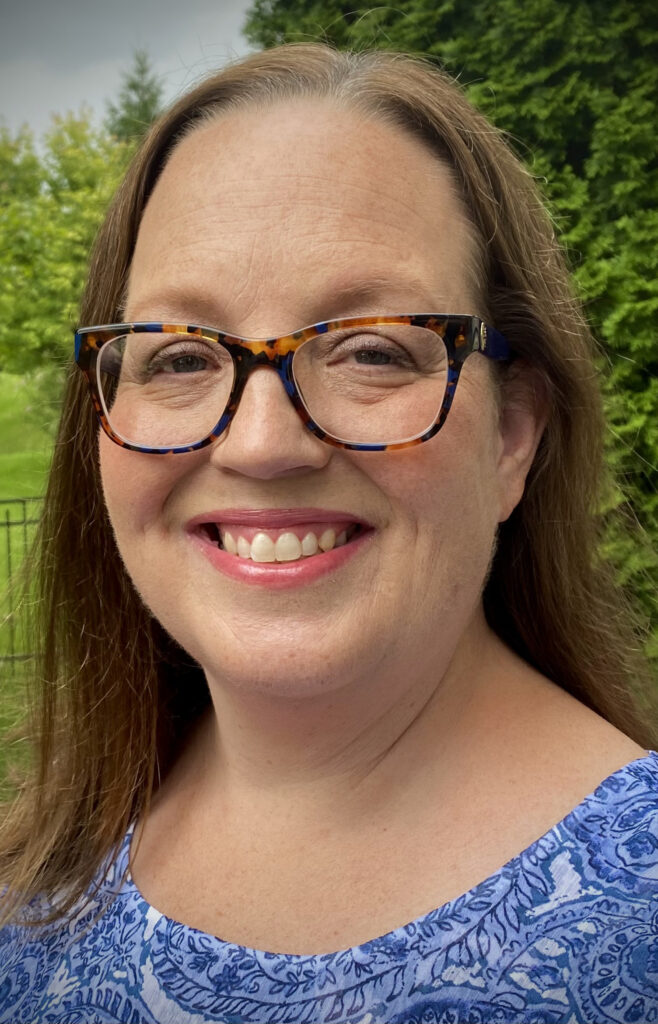 Lynn Leschuk. Clinical Social Worker. Female. Wears glasses. Brown hair and Blue eyes.