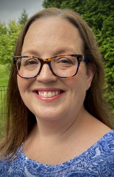 Lynn Leschuk. Clinical Social Worker. Female. Wears glasses. Brown hair and Blue eyes.